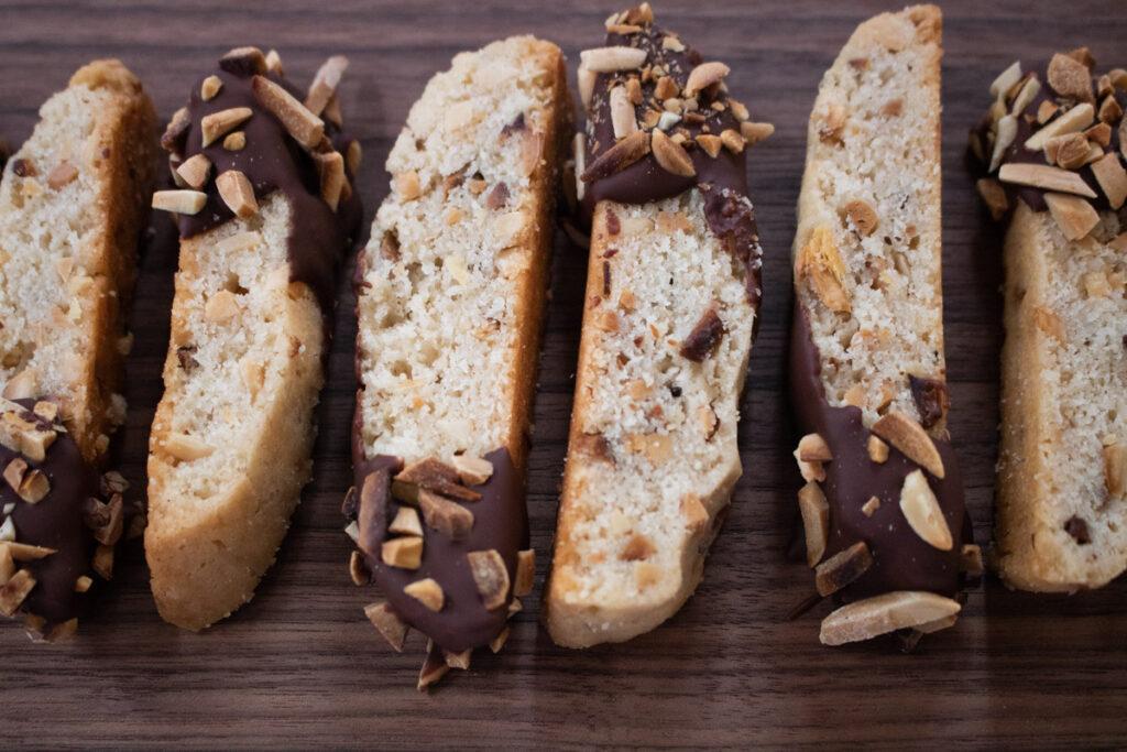 chocolate-dipped mandel bread on board