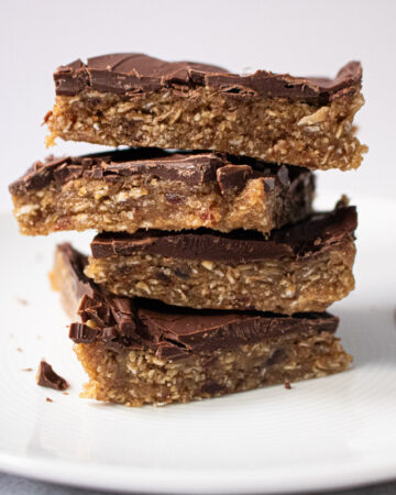 tahini date bars stacked on plate