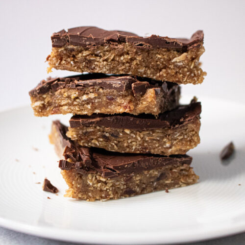 tahini date bars stacked on plate