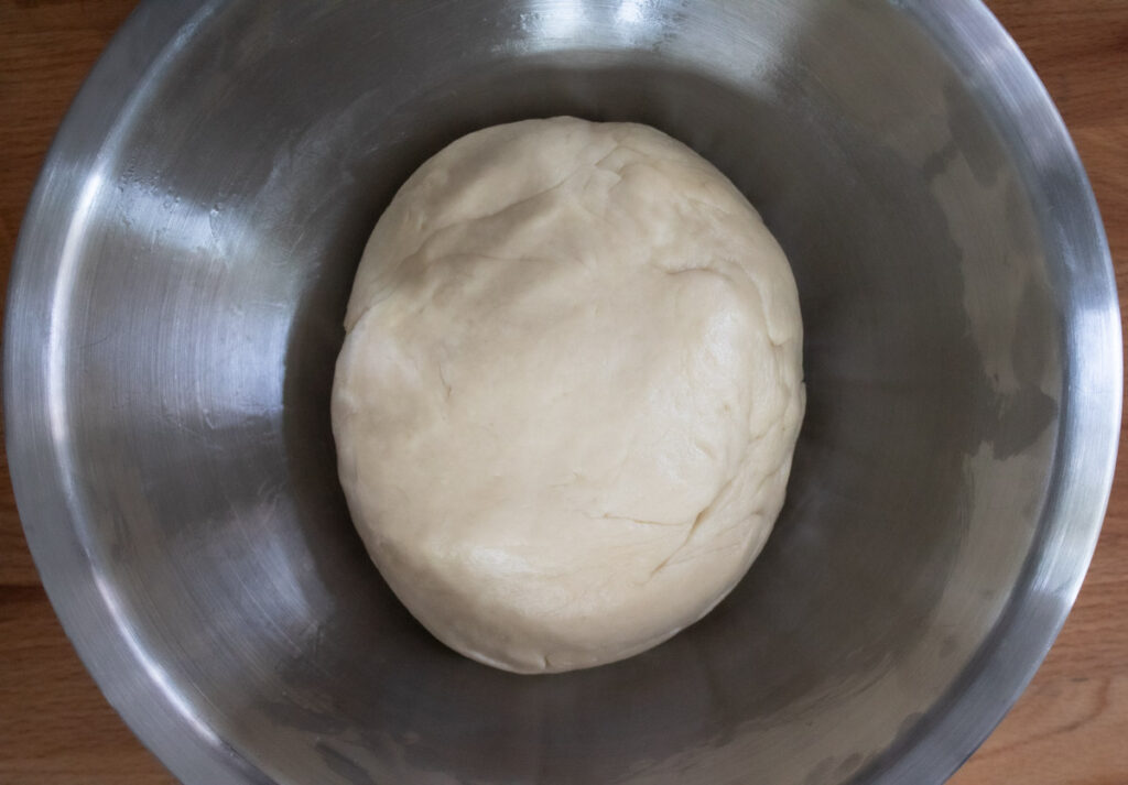 dough in bowl before first rise