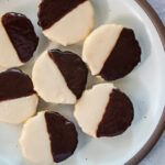 Black and white cookies on white plate