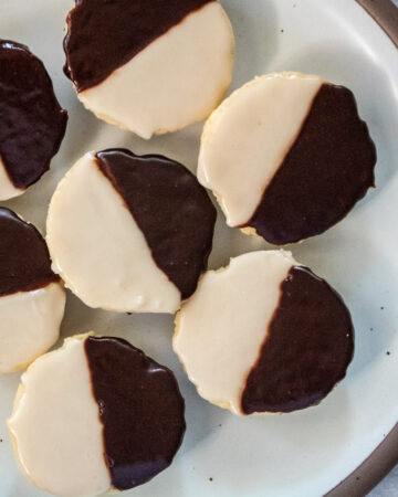 Black and white cookies on white plate